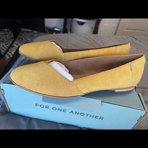 Never worn Suede TOMS flats